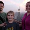 The wind-whipped family with the ESB in the background
